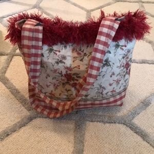 Red floral handbag